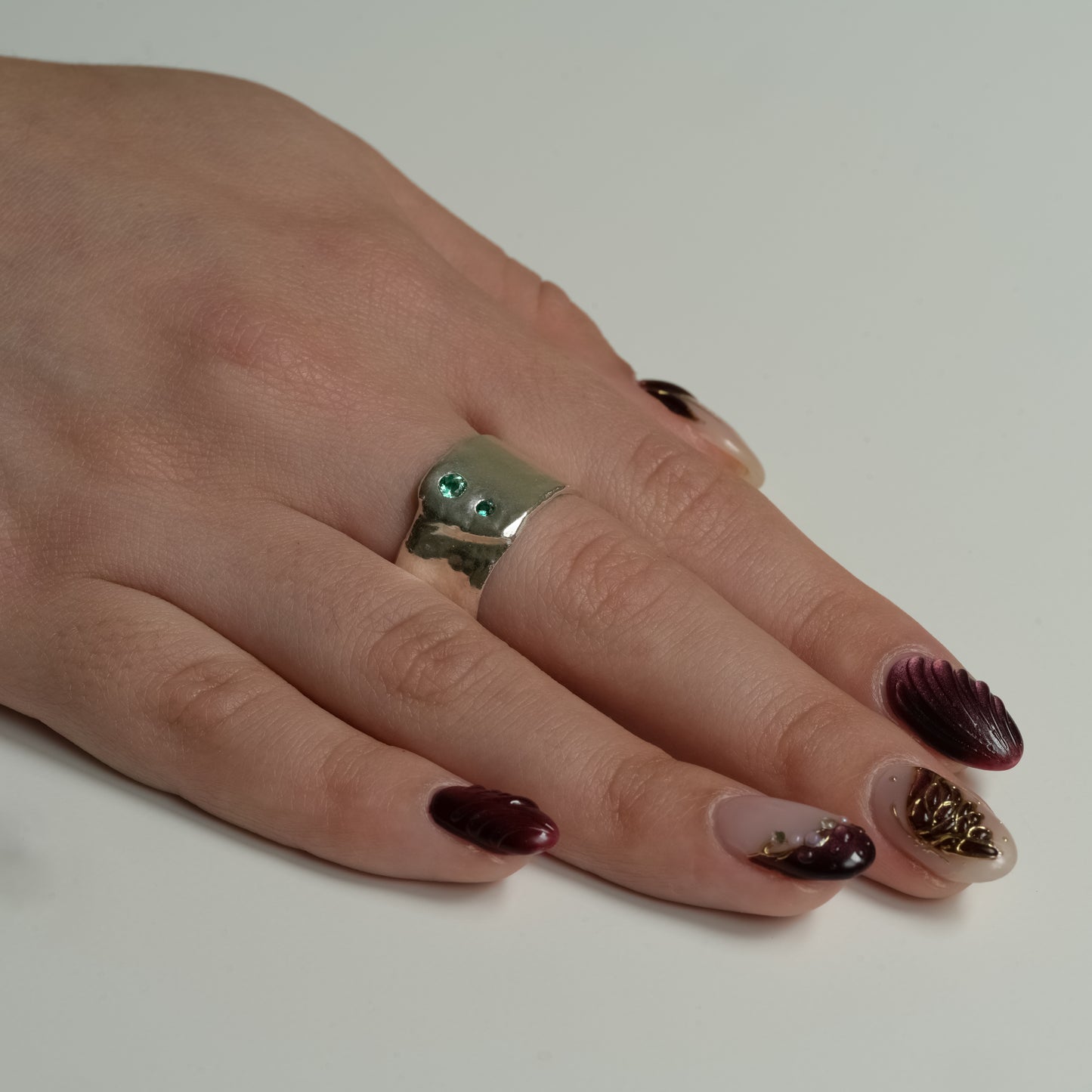 Side view of Emerald Duo Fine Silver Ring - Melted silver collection