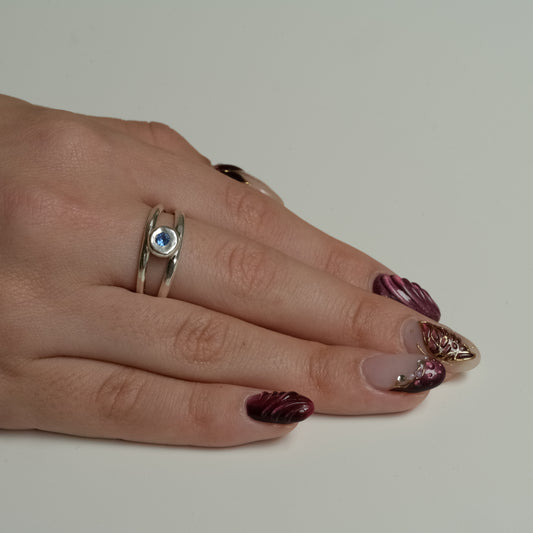 Side view of Blue Sapphire Silver Ring - Fine Silver Eye Design