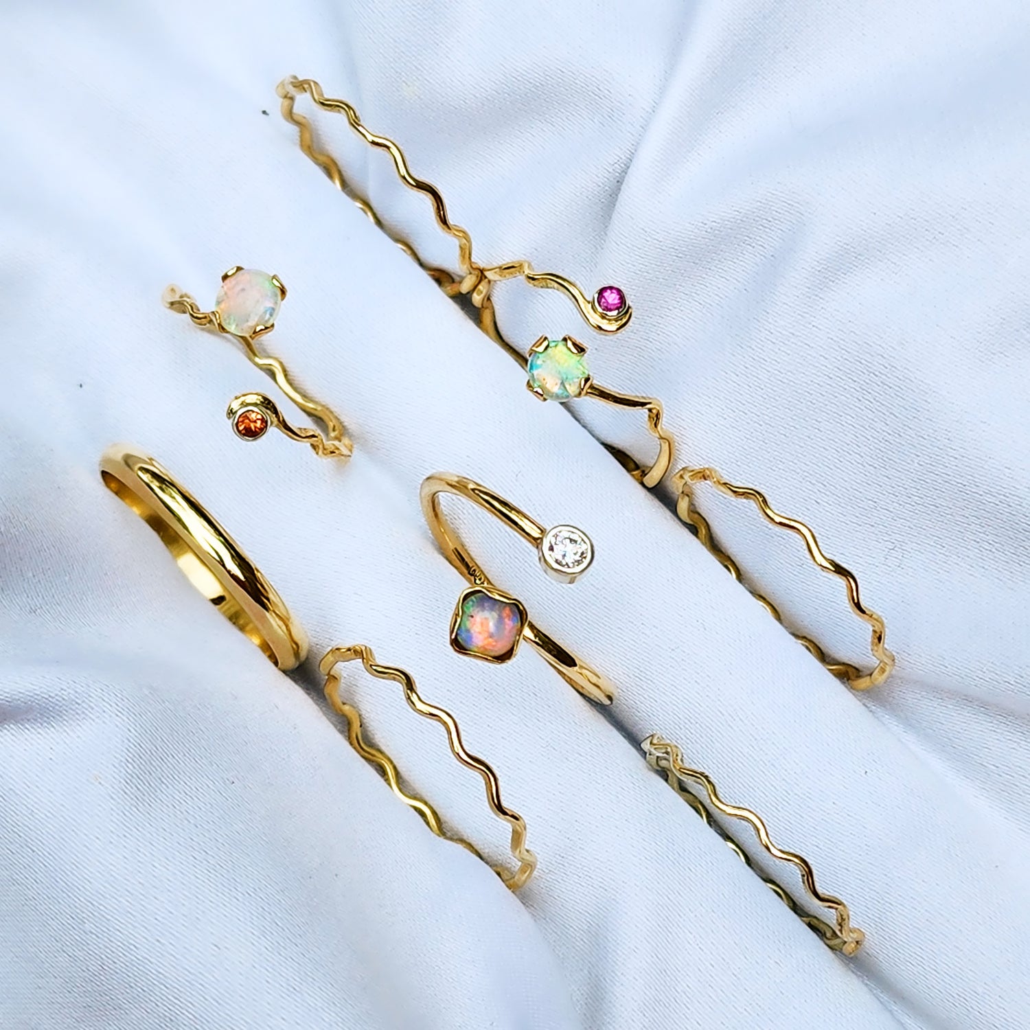 Gold rings with Opals, Sapphires, Diamonds