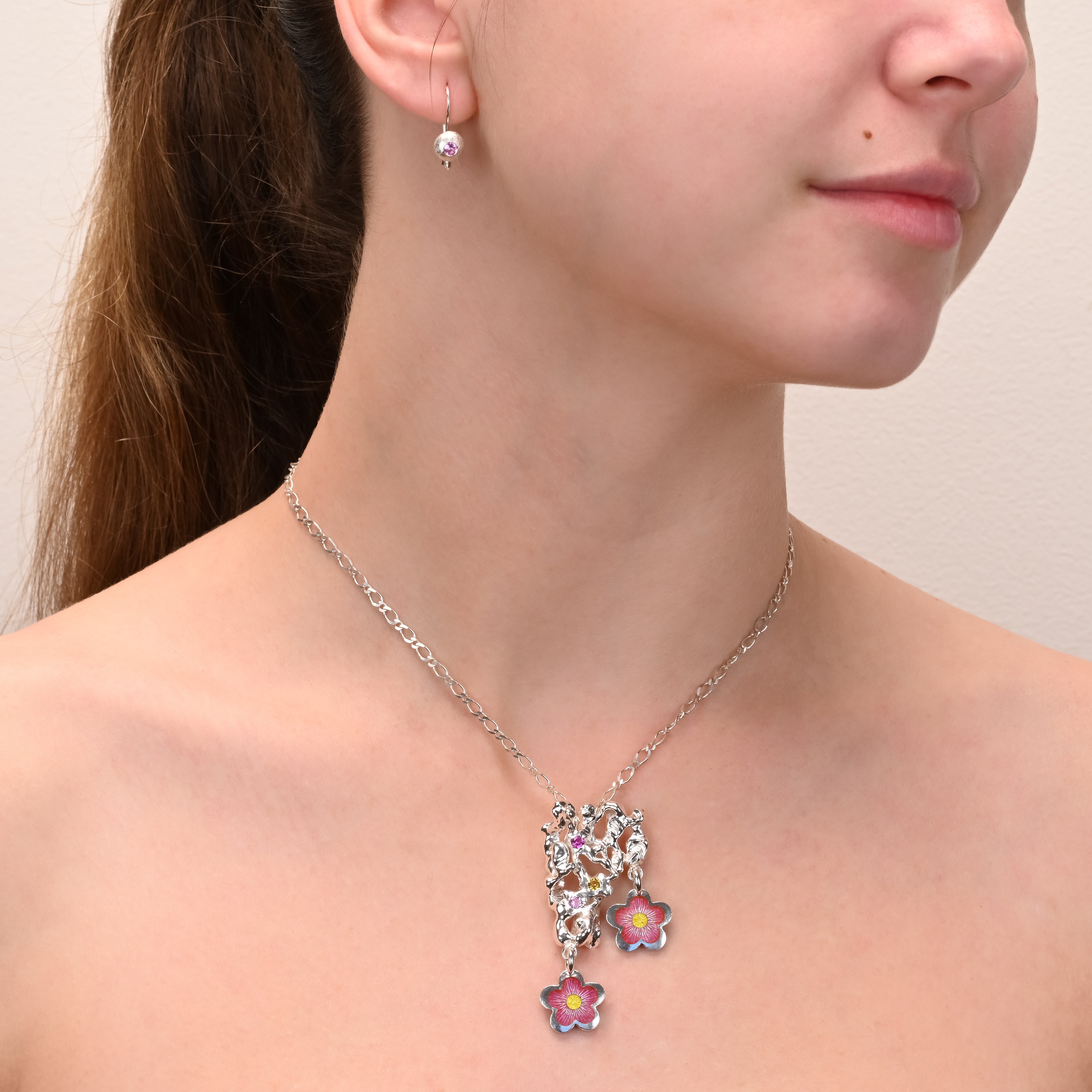 Alternate angle of Enamel Cherry Blossom Pendant with sapphires