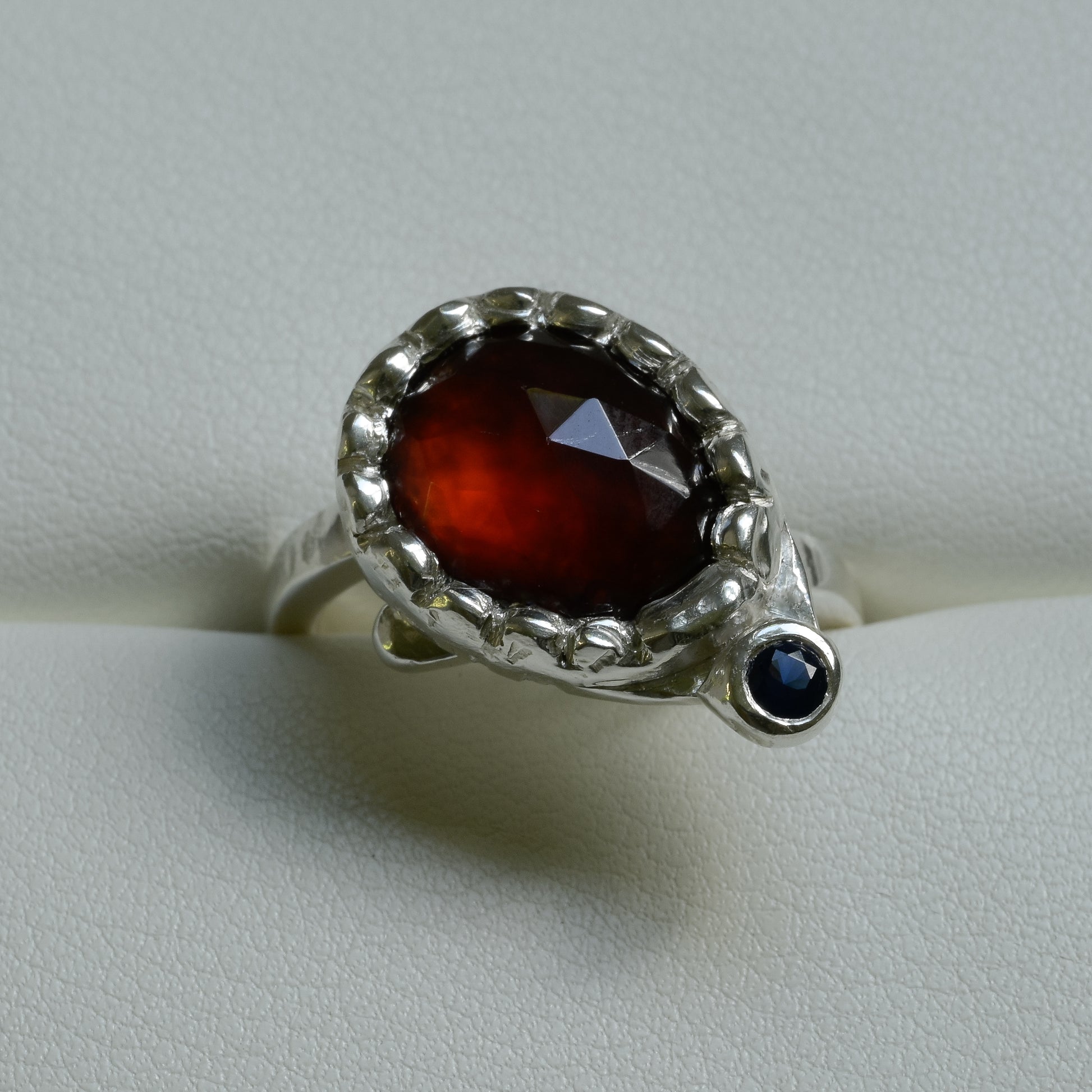 Detail close-up of Hessonite Garnet & Sapphire Ring - 999 Fine Silver Statement Ring