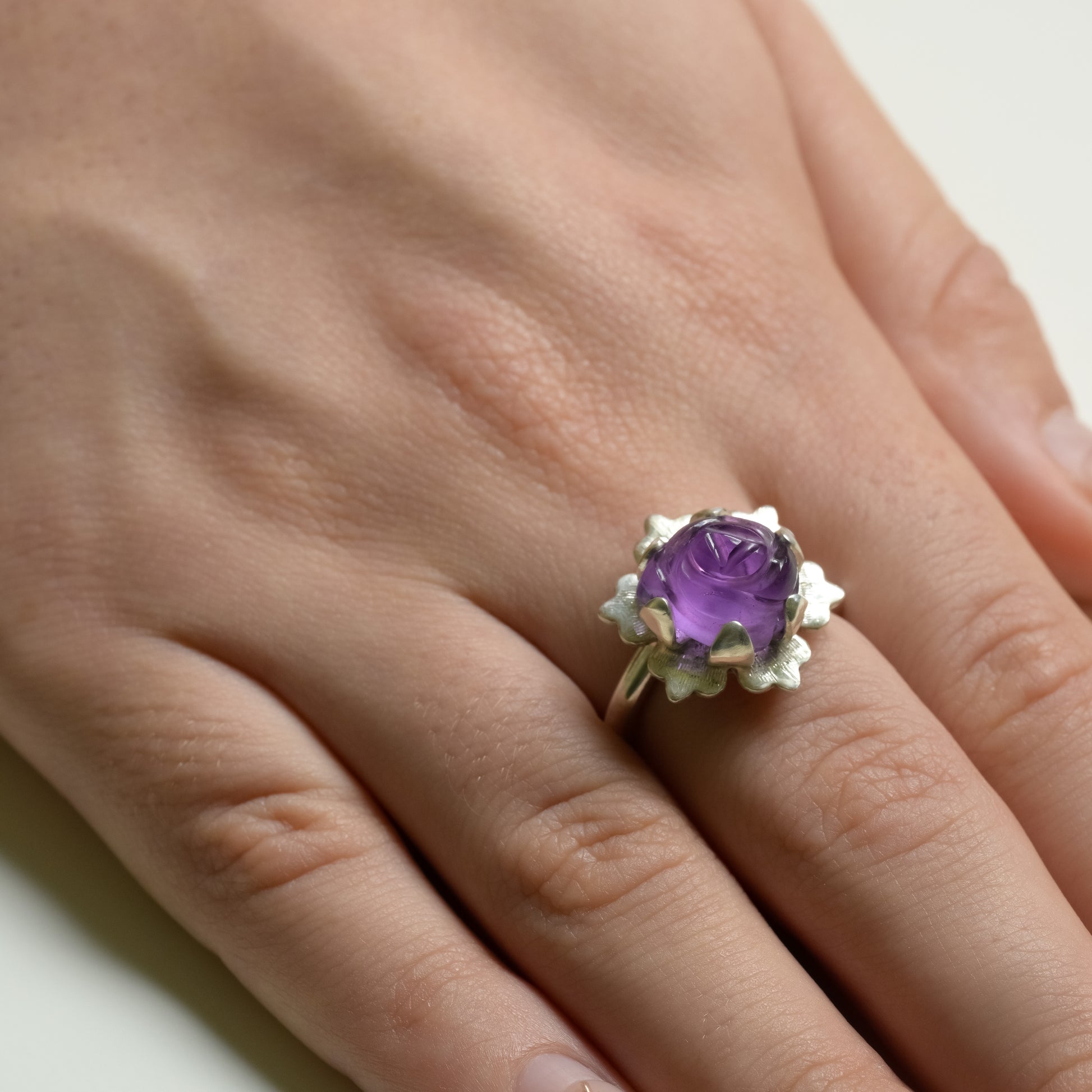 Detail close-up of Purple Amethyst Rose Ring - 999 Fine Silver Bloom Statement Ring