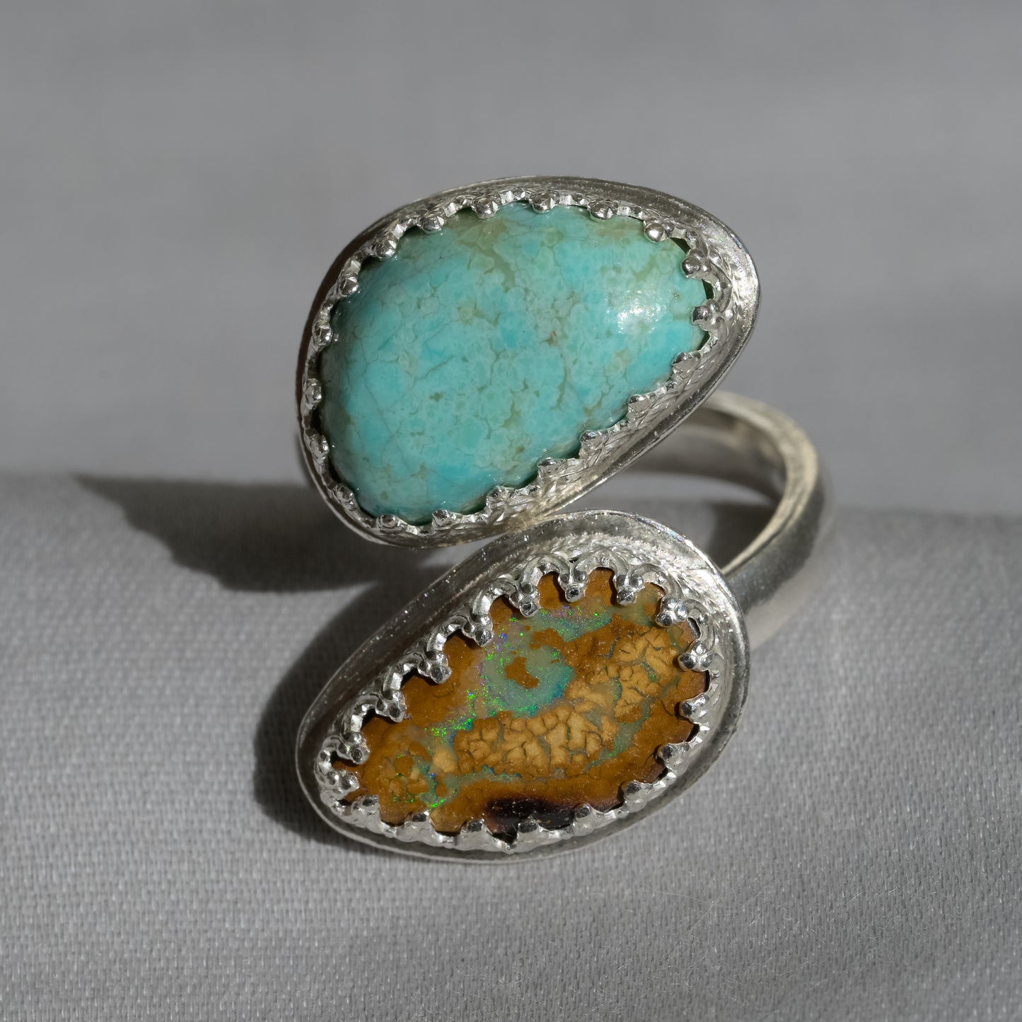 Worn view of Snake Skin Turquoise & Boulder Opal Silver Ring