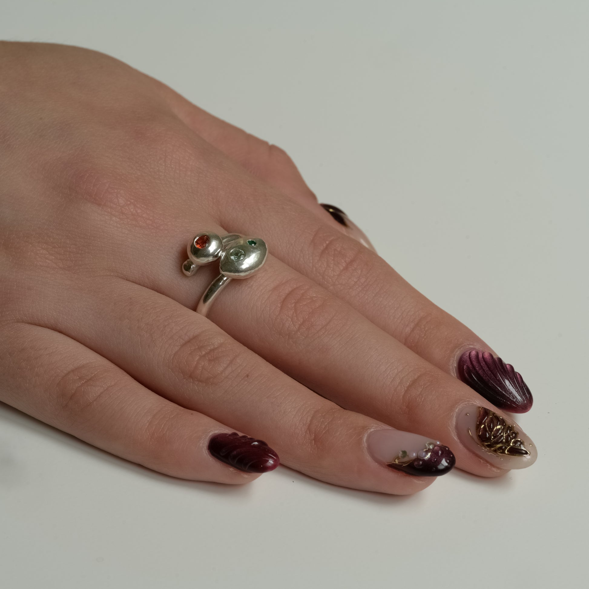 Side view of Cosmic Cascade Ring - Fine Silver Sapphire & Paraiba Garnet Trio