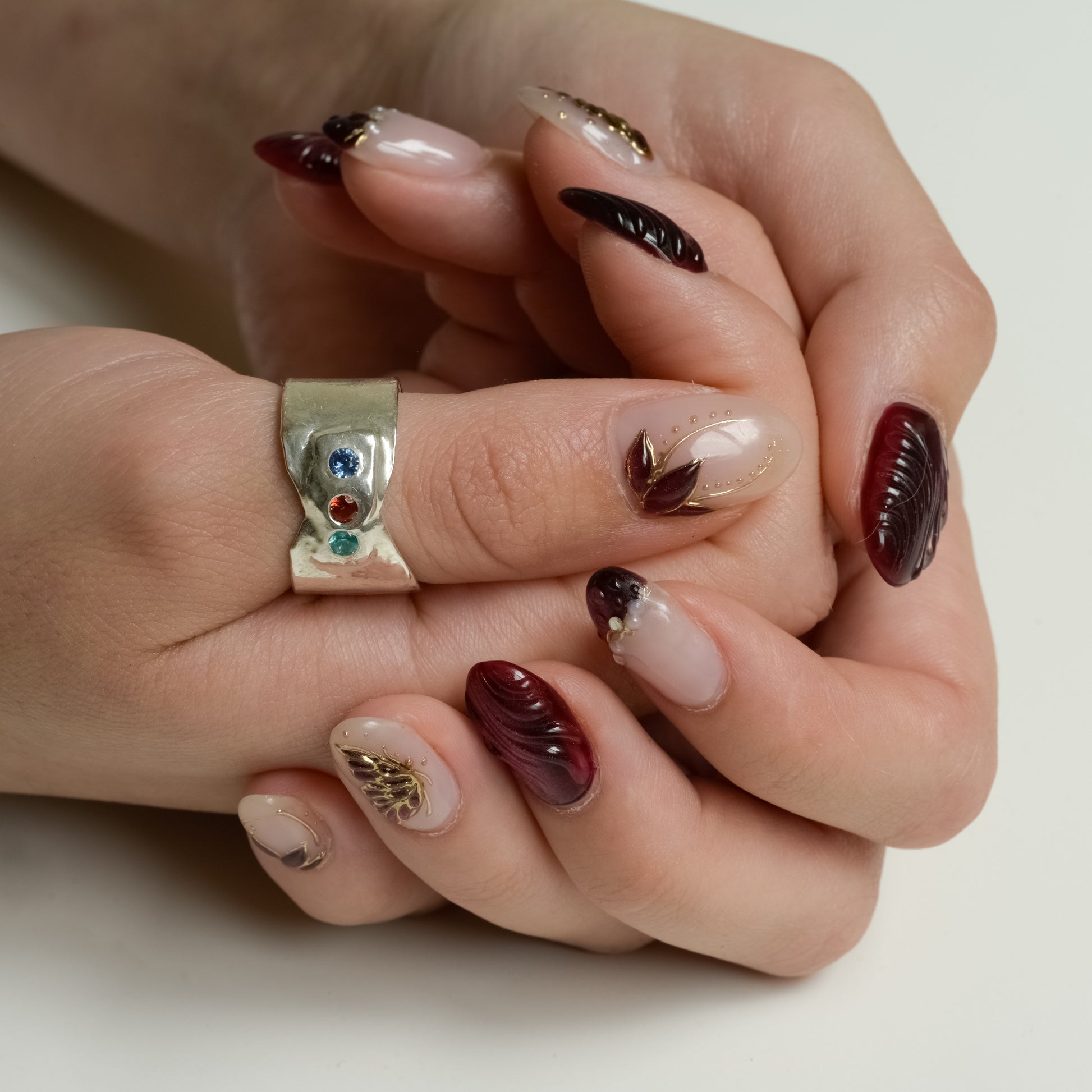 Side view of Celestial Triple Stone Ring - Fine Silver with Sapphire & Garnet