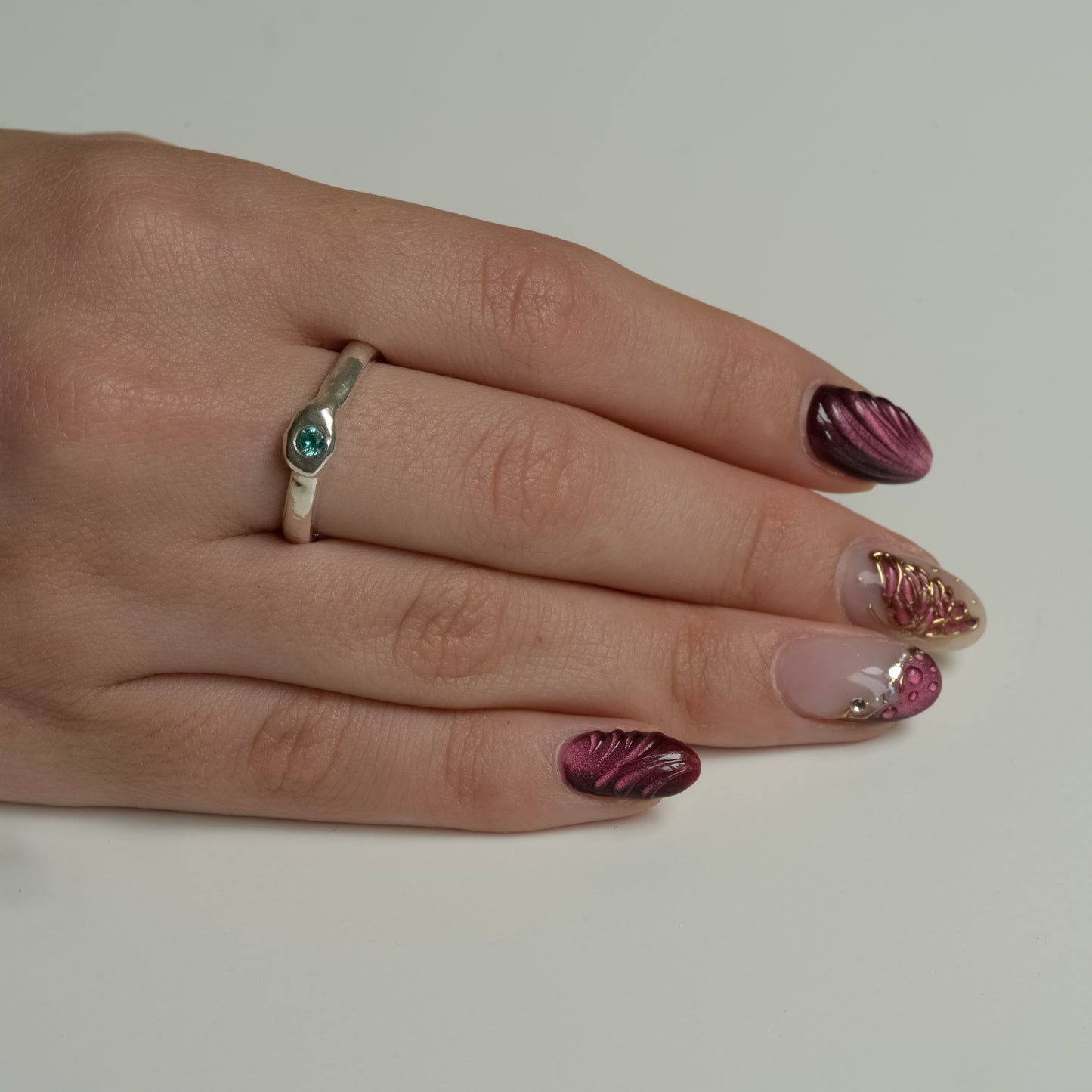 Side view of Paraiba Garnet Fine Silver Ring