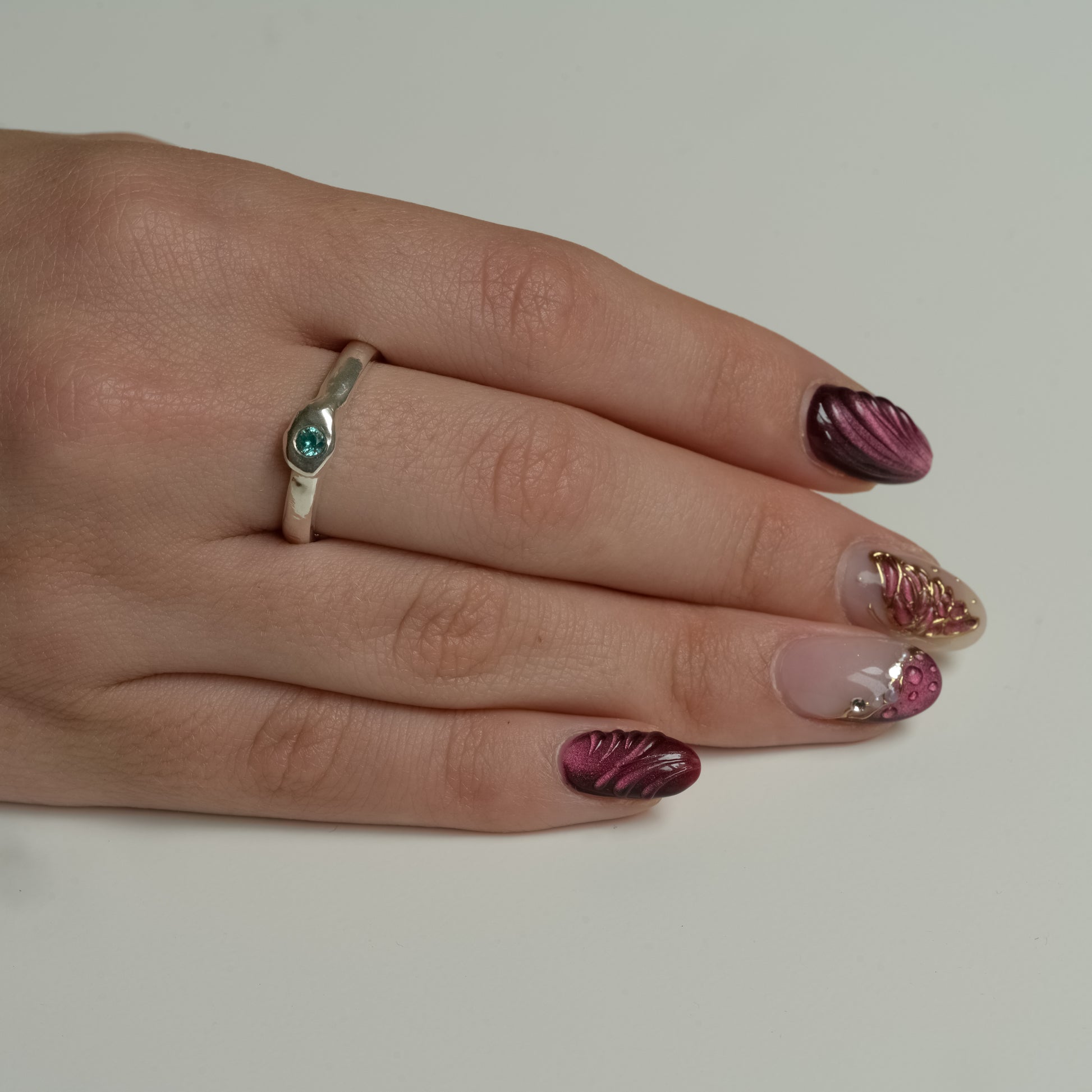 Side view of Paraiba Garnet Fine Silver Ring