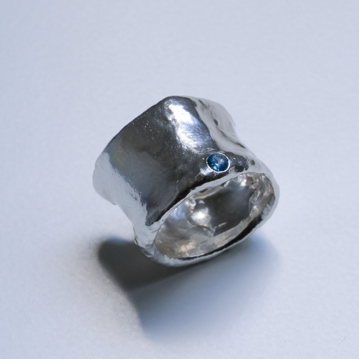 Worn view of Melted Silver Ring with sapphires and diamond Ocean