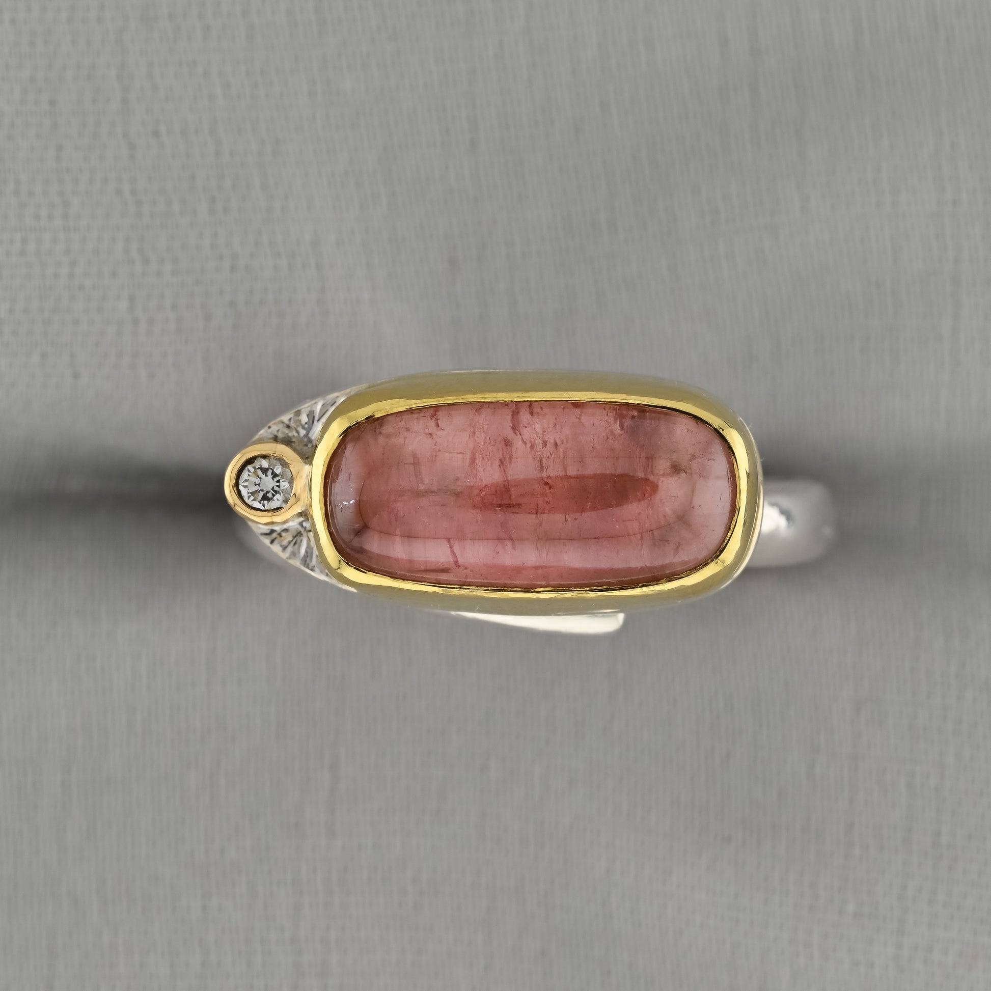 Detail close-up of Jelly Pink Tourmaline 22 carat Gold and Silver Ring with diamond