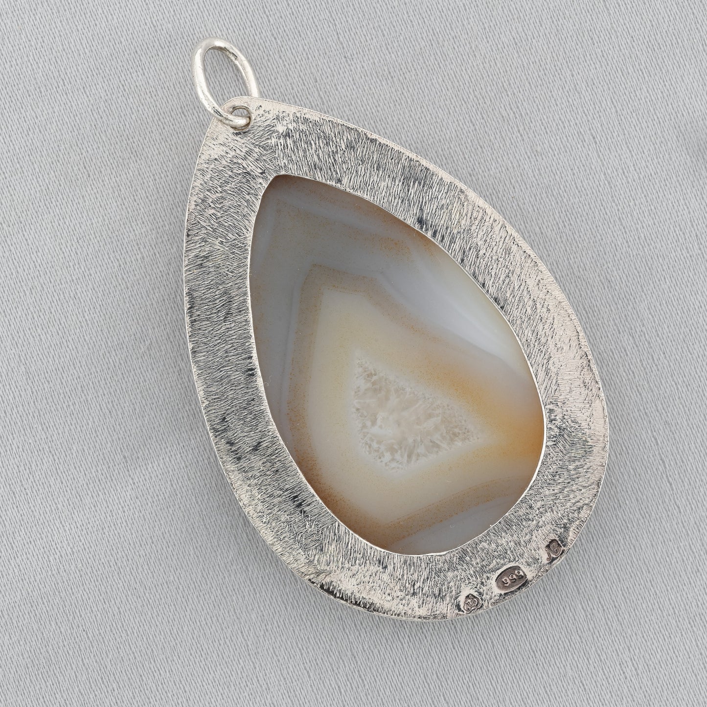 Detail close-up of Agate Fine Silver Pendant