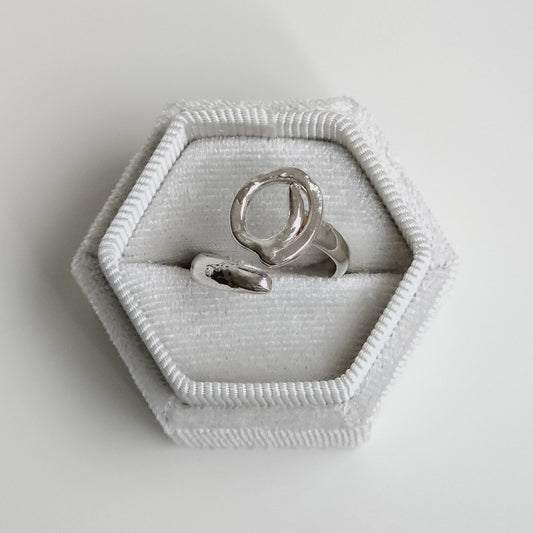 Close-up detail of Melted squiggly silver ring