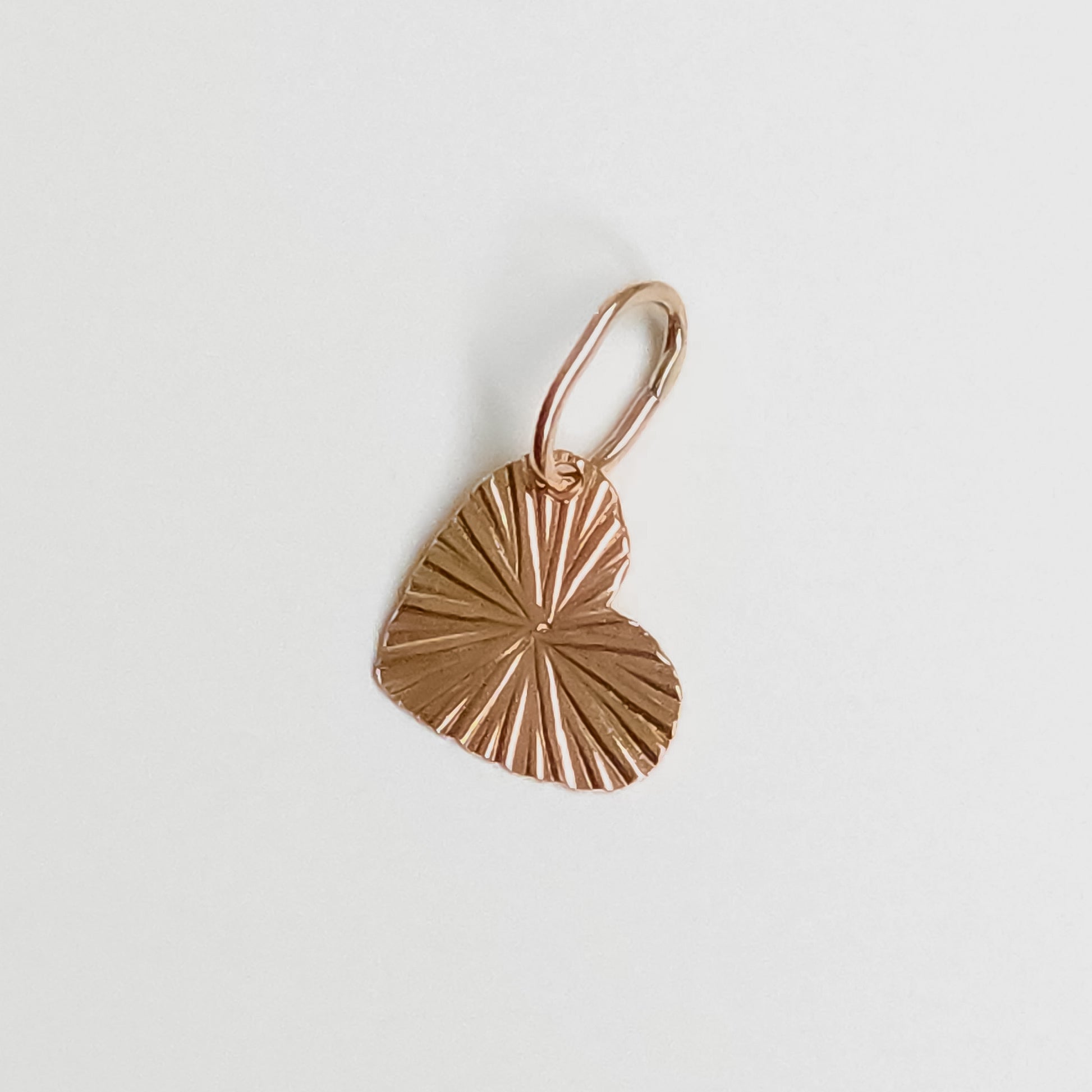 Close-up detail of Gold Little Heart Pendant