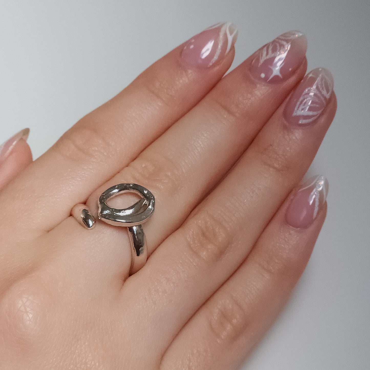 Melted squiggly silver ring