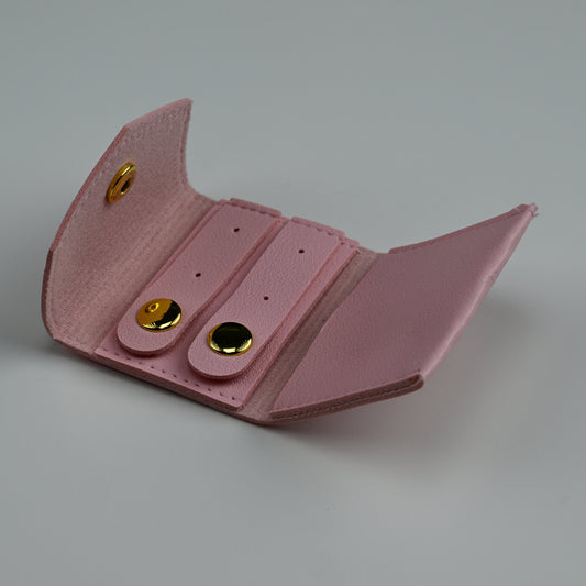 Open pink envelope jewellery pouch showing snap tabs for rings and studs