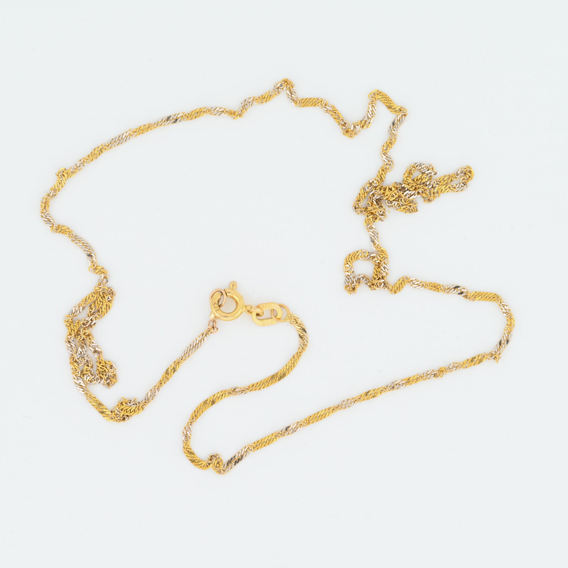 white and yellow gold singapore chain